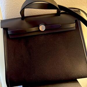 She bag black with silver hardware
